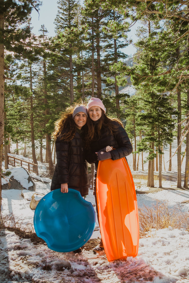 Women sledding in mammoth lakes