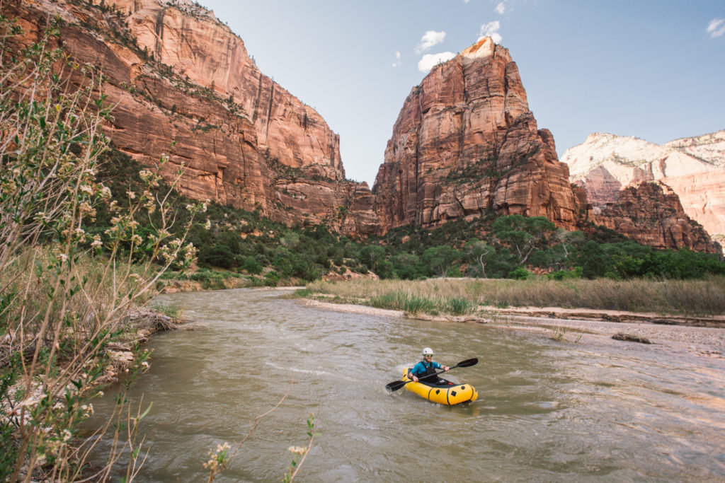 A rafter padeling the Virgin River.
