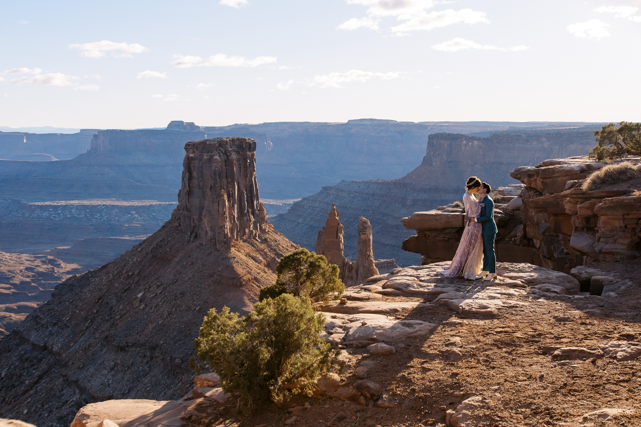 queer couple exchanging vows in Moab