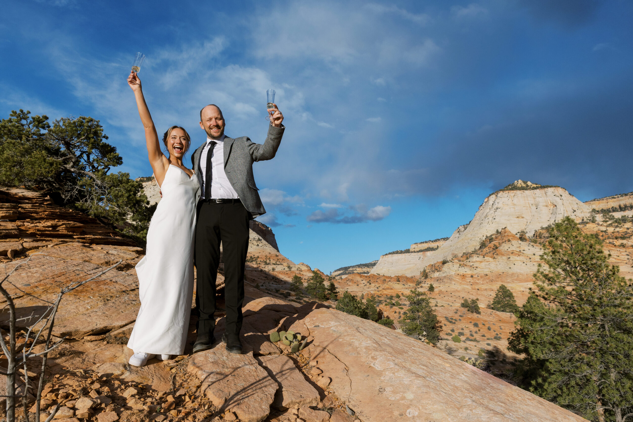 couple toasting with champaign in zion